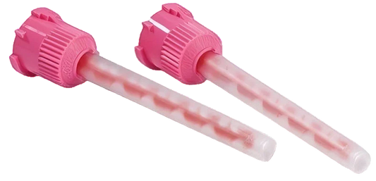 Two pink and clear plastic syringes on a white background